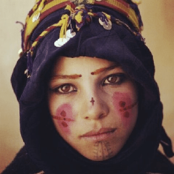 Ink and Identity: Exploring the Enigmatic World of Amazigh Tattoos in  Morocco - Adrar Travel Morocco