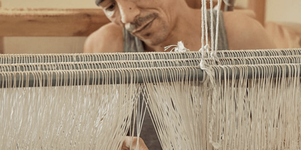Art-Tissage-Tameslouht-Cooperative-Man-with-Loom-Morocco-Travel-Blog